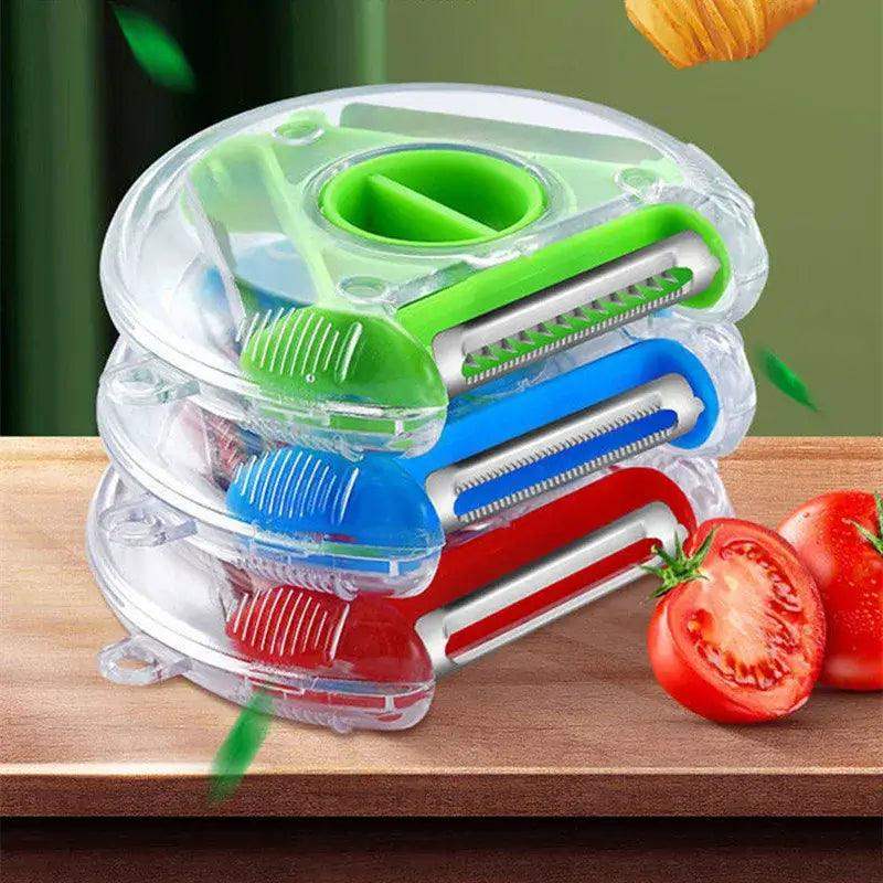 3 in 1 vegetable peeler set with green, blue, and red designs, featuring stainless steel blades and tomatoes on wooden table.