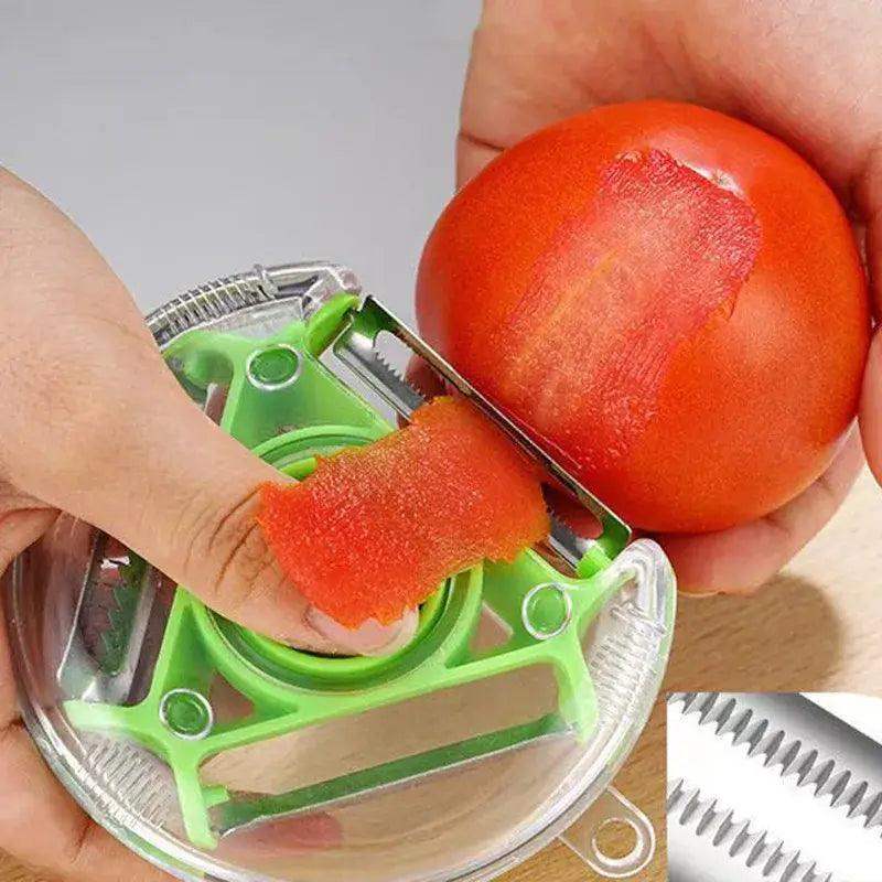 Hand using a 3 in 1 vegetable peeler on a tomato, showcasing precision peeling with stainless steel blades.