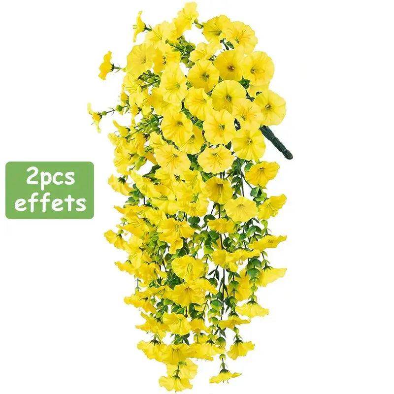 Vibrant artificial yellow morning glory flowers in cascading vines for outdoor home decoration.